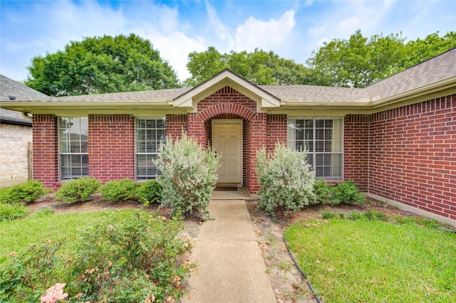 24014 Whitefield Ln, Katy, TX 77493 - property entrance featuring brick siding and a shingled roof