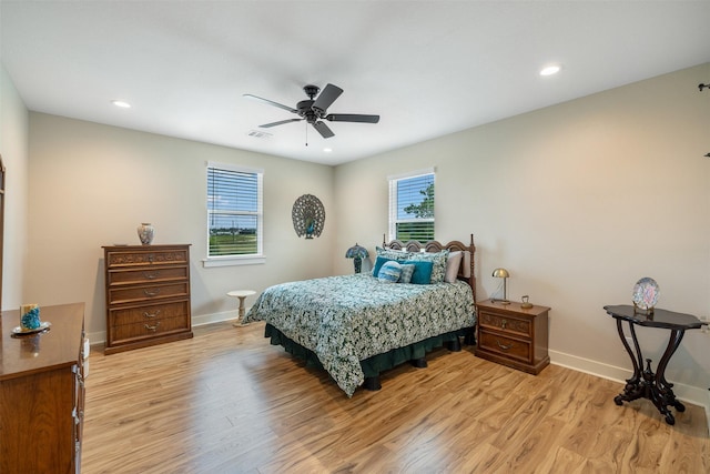 5292 Horseshoe Dr, Anderson, TX 77830 - bedroom with light wood-style flooring, baseboards, ceiling fan, and recessed lighting