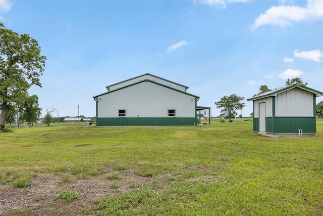 5292 Horseshoe Dr, Anderson, TX 77830 - view of green lawn with an outdoor structure and a pole building