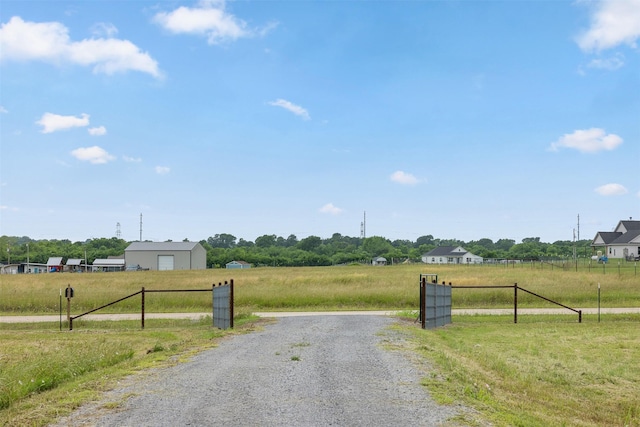 5292 Horseshoe Dr, Anderson, TX 77830 - view of dirt / gravel road featuring a rural view and a gated entry