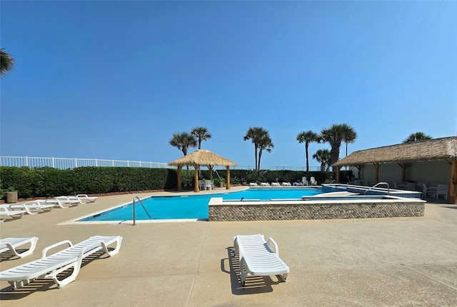 7700 Seawall Blvd Unit 409, Galveston, TX 77551 - community pool with a gazebo and a patio