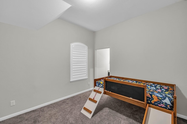 5803 Platinum Lakes Ct, Rosenberg, TX 77469 - bedroom with lofted ceiling, carpet flooring, and baseboards