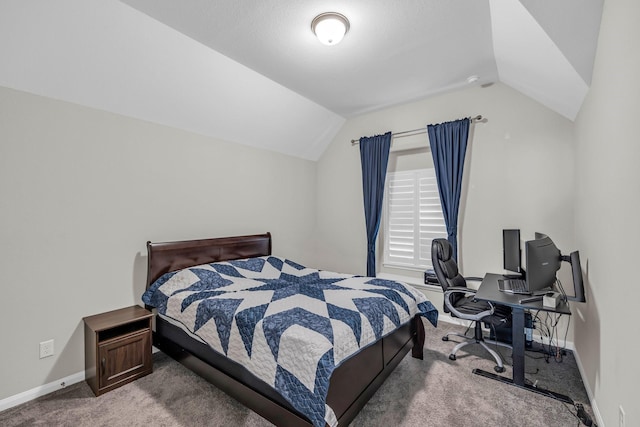 5803 Platinum Lakes Ct, Rosenberg, TX 77469 - bedroom with vaulted ceiling, carpet floors, baseboards, and a desk