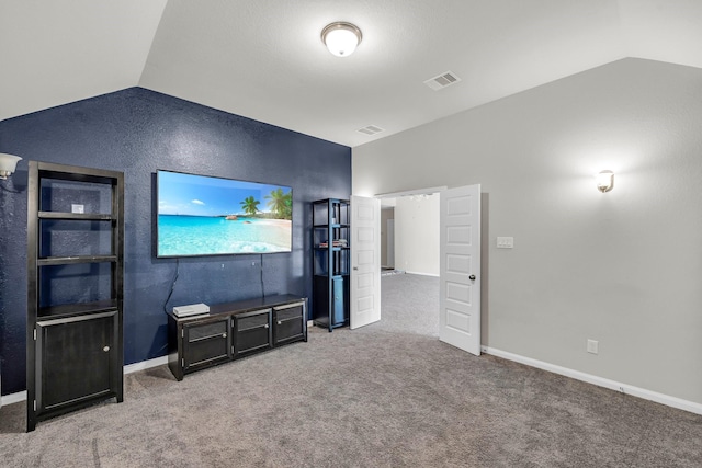 5803 Platinum Lakes Ct, Rosenberg, TX 77469 - unfurnished living room featuring lofted ceiling, carpet floors, and baseboards