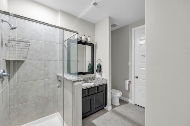 5803 Platinum Lakes Ct, Rosenberg, TX 77469 - full bath featuring a shower stall, toilet, tile patterned floors, and vanity