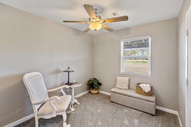 14440 Fm 1696th Rd, Bedias, TX 77831 - sitting room featuring a ceiling fan, carpet, and baseboards