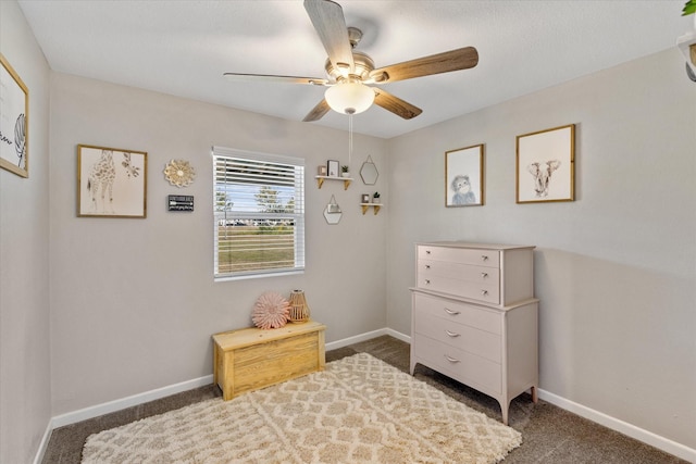 14440 Fm 1696th Rd, Bedias, TX 77831 - bedroom featuring dark colored carpet, baseboards, and a ceiling fan