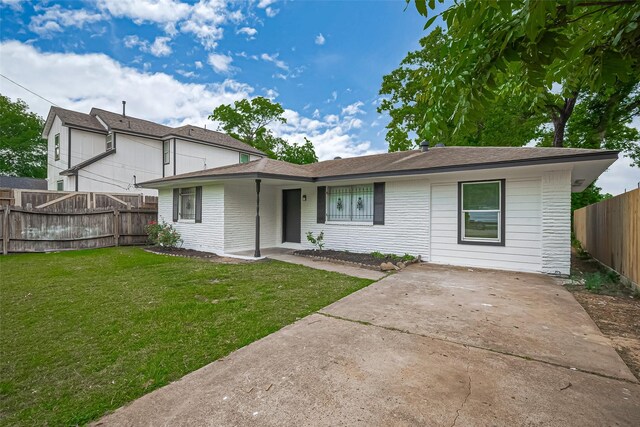 1029 Dolly Wright St, Houston, TX 77088 - view of front of house with driveway and a patio area