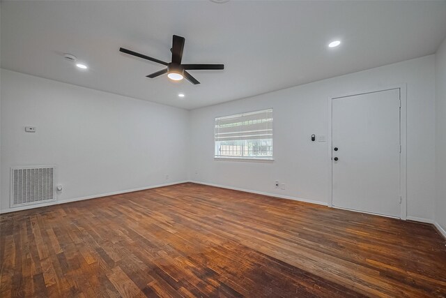 1029 Dolly Wright St, Houston, TX 77088 - unfurnished room with a ceiling fan, dark wood-style floors, baseboards, and recessed lighting