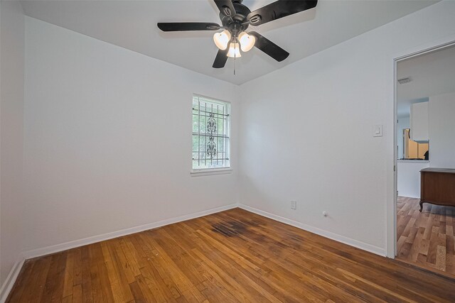 1029 Dolly Wright St, Houston, TX 77088 - spare room with hardwood / wood-style floors, baseboards, and ceiling fan