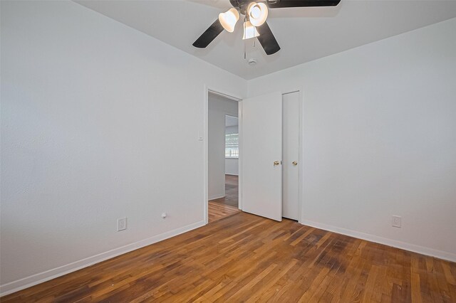 1029 Dolly Wright St, Houston, TX 77088 - unfurnished room featuring a ceiling fan, wood-type flooring, and baseboards