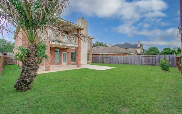 6018 Lamb Crk, Missouri City, TX 77459 - rear view of property with brick siding, a patio, a balcony, and a chimney