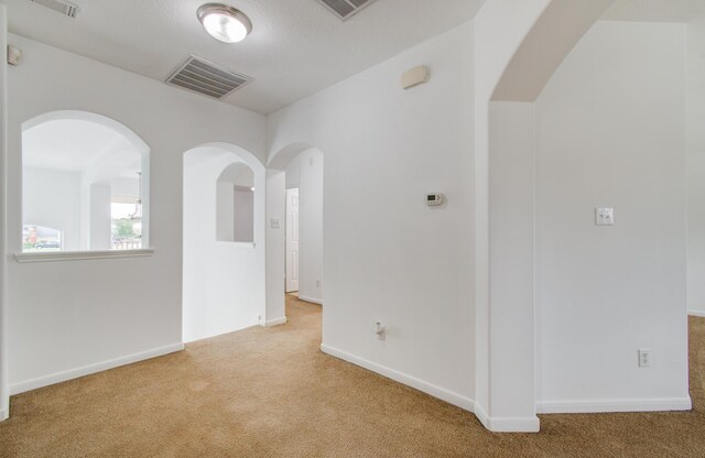 6018 Lamb Crk, Missouri City, TX 77459 - unfurnished room with light carpet and baseboards