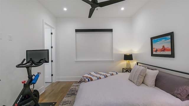 1410 Indiana St, Houston, TX 77006 - bedroom with wood finished floors, baseboards, recessed lighting, and ceiling fan