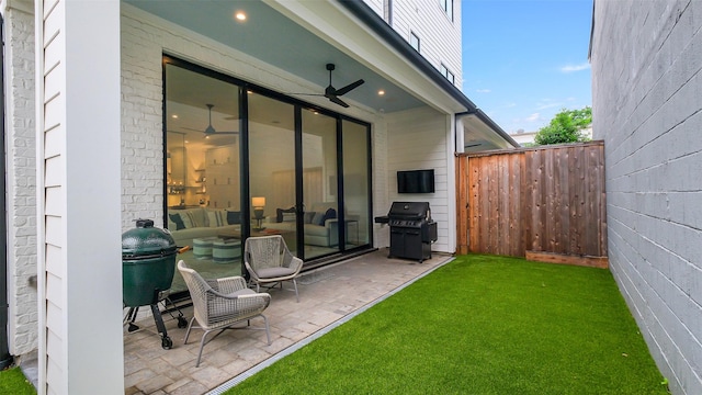 1410 Indiana St, Houston, TX 77006 - view of yard featuring ceiling fan and a patio