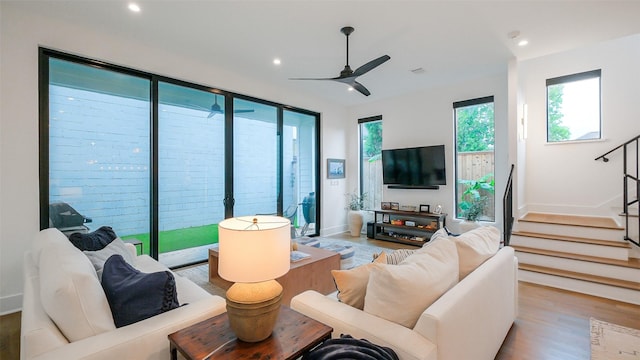 1410 Indiana St, Houston, TX 77006 - living room with wood finished floors, stairs, recessed lighting, ceiling fan, and baseboards