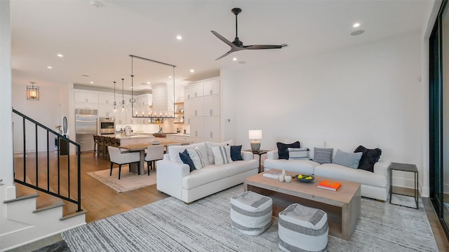 1410 Indiana St, Houston, TX 77006 - living room with stairway, wood finished floors, ceiling fan, and recessed lighting