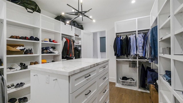 1410 Indiana St, Houston, TX 77006 - walk in closet with dark wood-type flooring