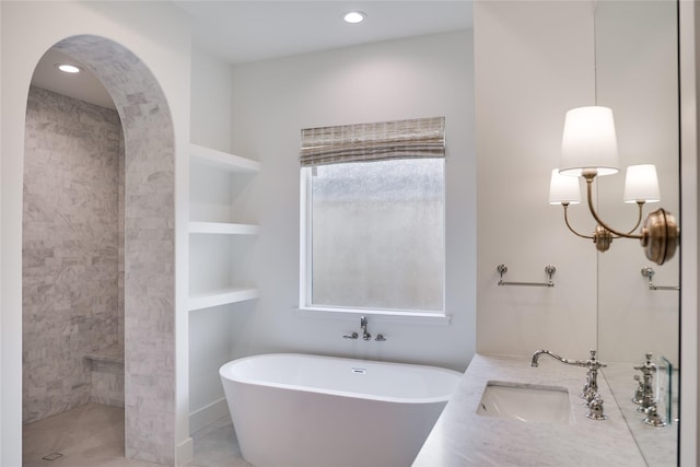 1732 Libbey Dr, Houston, TX 77018 - full bathroom with built in shelves, a soaking tub, vanity, recessed lighting, and a shower