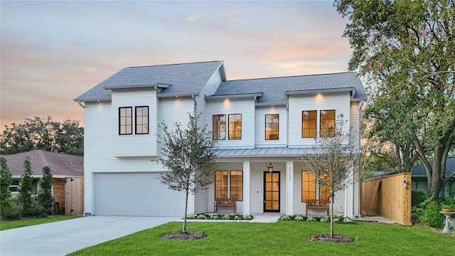 1732 Libbey Dr, Houston, TX 77018 - modern farmhouse featuring roof with shingles, an attached garage, a porch, driveway, and a standing seam roof