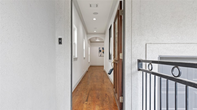 1415 W 21st St Unit A, Houston, TX 77008 - corridor featuring arched walkways, wood finished floors, a textured wall, baseboards, and recessed lighting