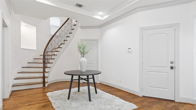 1415 W 21st St Unit A, Houston, TX 77008 - foyer entrance with stairway, wood finished floors, recessed lighting, a tray ceiling, and baseboards