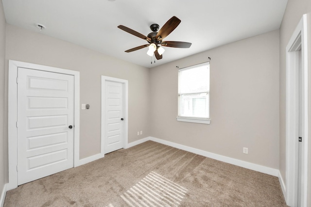 1544 W 23rd St Unit B, Houston, TX 77008 - unfurnished bedroom with carpet floors, baseboards, and a ceiling fan