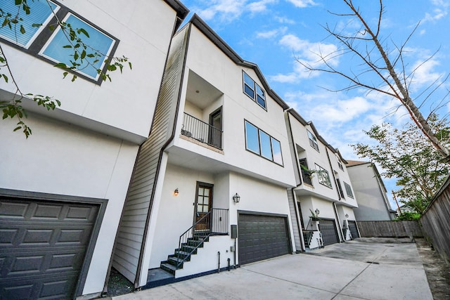 1544 W 23rd St Unit B, Houston, TX 77008 - view of property with a garage and concrete driveway