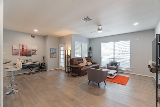6607 Lake Woodlands Dr Unit 312, The Woodlands, TX 77382 - living room featuring wood finished floors, baseboards, a ceiling fan, and recessed lighting