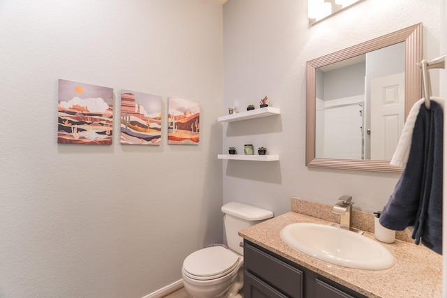 6607 Lake Woodlands Dr Unit 312, The Woodlands, TX 77382 - bathroom with vanity and toilet