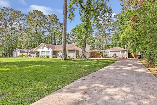 1310 Hickory Ln, Houston, TX 77339 - ranch-style home featuring driveway