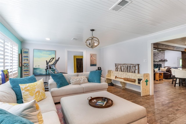 1310 Hickory Ln, Houston, TX 77339 - living room with a chandelier, crown molding, and plenty of natural light
