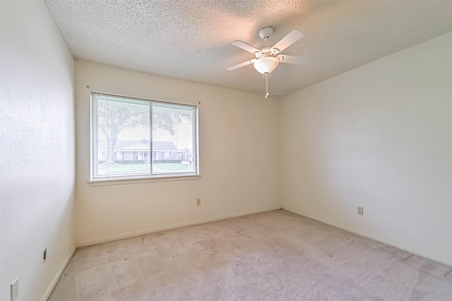 15419 Diana Ln, Houston, TX 77062 - spare room featuring light carpet, a textured ceiling, and ceiling fan