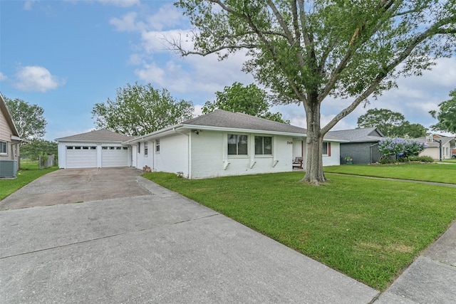 15419 Diana Ln, Houston, TX 77062 - ranch-style home featuring concrete driveway, a front yard, brick siding, an attached garage, and roof with shingles