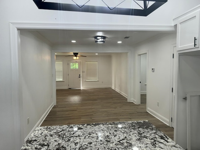 4120 Buffalo St, Beaumont, TX 77703 - hallway with dark wood-style flooring, crown molding, baseboards, and recessed lighting