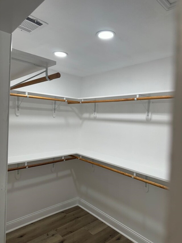 4120 Buffalo St, Beaumont, TX 77703 - spacious closet featuring dark wood-style flooring