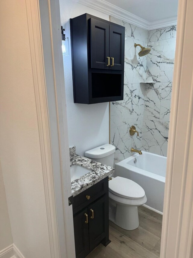 4120 Buffalo St, Beaumont, TX 77703 - full bathroom with wood finished floors, vanity, toilet, shower / washtub combination, and ornamental molding