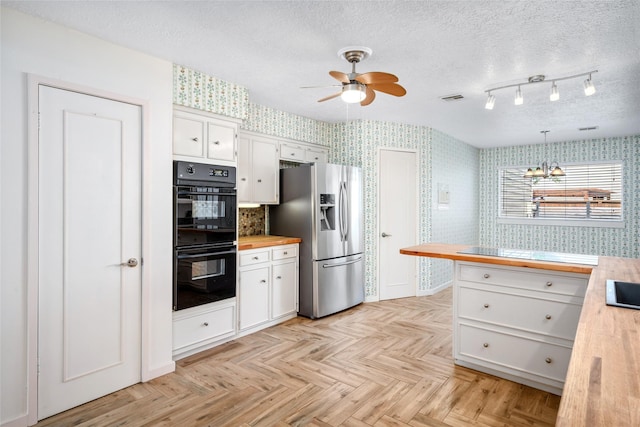 707 Center Hill Dr, Houston, TX 77079 - kitchen featuring stainless steel refrigerator with ice dispenser, wallpapered walls, a chandelier, a ceiling fan, and butcher block countertops
