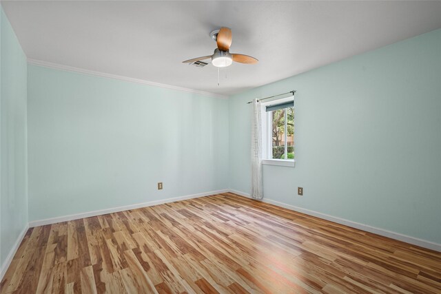 707 Center Hill Dr, Houston, TX 77079 - empty room with wood finished floors, baseboards, a ceiling fan, and crown molding