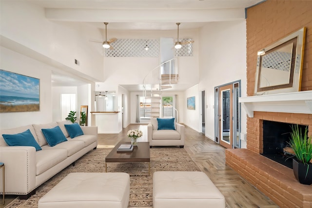 707 Center Hill Dr, Houston, TX 77079 - living area featuring a towering ceiling, a fireplace, and ceiling fan