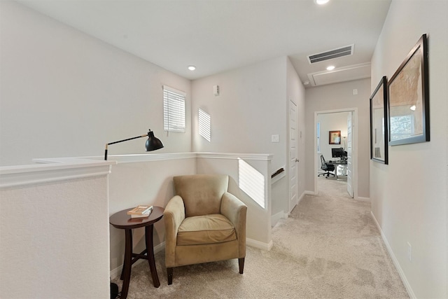 5514 Oriente Ln, Houston, TX 77023 - living area featuring carpet, baseboards, and recessed lighting