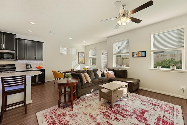 5514 Oriente Ln, Houston, TX 77023 - living room featuring a ceiling fan, wood finished floors, baseboards, and recessed lighting