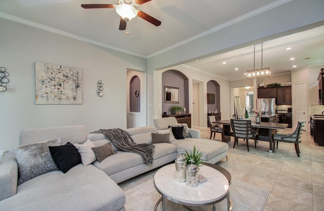 3111 Jane Way, Richmond, TX 77406 - living area featuring arched walkways, crown molding, a ceiling fan, recessed lighting, and light tile patterned floors