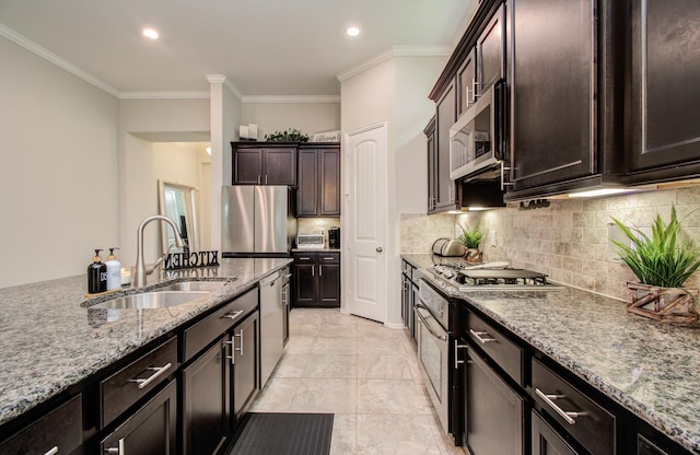 3111 Jane Way, Richmond, TX 77406 - kitchen with a sink, stainless steel appliances, light stone countertops, crown molding, and dark brown cabinets
