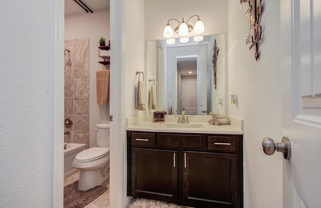 3111 Jane Way, Richmond, TX 77406 - bathroom featuring vanity, toilet, washtub / shower combination, tile patterned flooring, and a textured wall