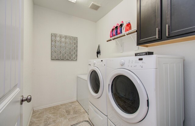 3111 Jane Way, Richmond, TX 77406 - washroom with cabinet space, separate washer and dryer, and baseboards