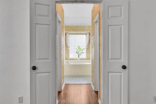 20434 Willow Trace Dr, Cypress, TX 77433 - corridor featuring wood finished floors