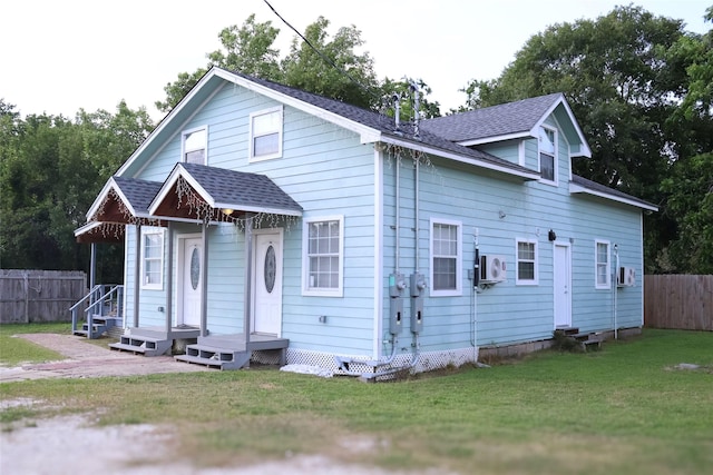 7301 Ave K, Houston, TX 77011 - bungalow-style house with a cooling unit and a shingled roof