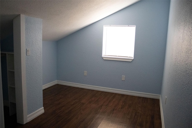 7301 Ave K, Houston, TX 77011 - bonus room with wood finished floors, baseboards, and vaulted ceiling