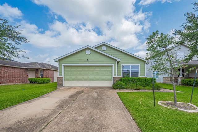 427 Sunset Colony Dr, Rosharon, TX 77583 - ranch-style home with driveway, a front yard, brick siding, and an attached garage